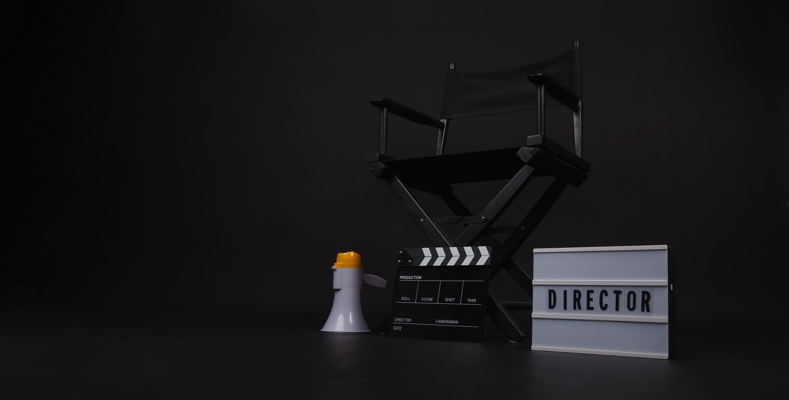 Set de dirección con claqueta y silla de director